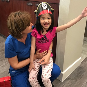 Dr. Gashparova and young dental patient