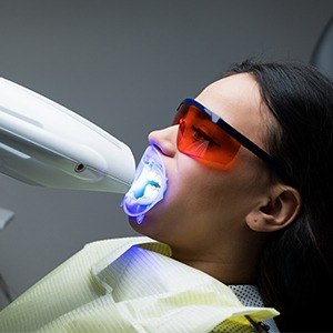 Patient receiving in-office teeth whitening