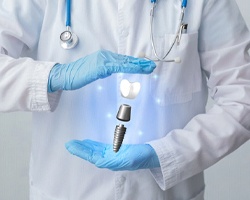 dentist with a digital model of a dental implant in their hands